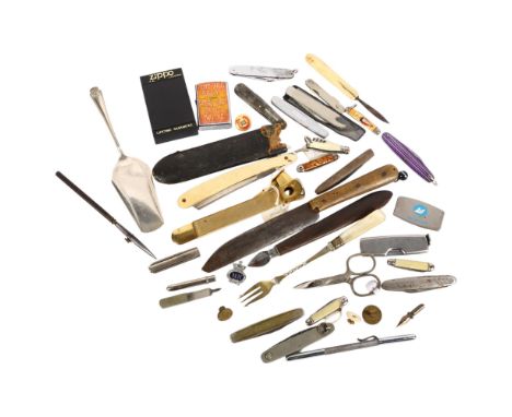 A collection of various penknives, pocket lighter, cigar cutter, etc