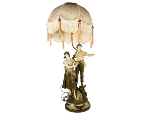 A large Continental painted metal table lamp, supported by 2 country figures, with shade, H92cm overall, stamped LE Moreau