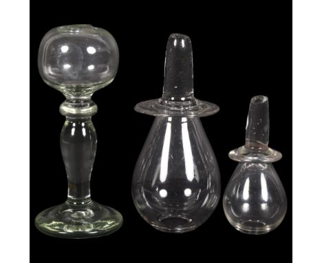 An Antique glass lacemaker's oil lamp, H16cm, together with 2 Antique blown glass blood letting glasses (3)
