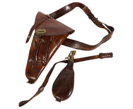 An Antique brown leather brass-mounted holster and belt, the holster having 3 crowns impressed upon the flap, an 18th century