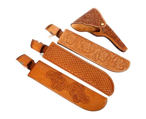 A group of 3 tooled tanned leather machete scabbards, overall length 49cm, together with a tan tooled leather holster, all fr