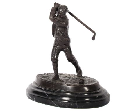 A cast-bronze sculpture of a golfer, unsigned, on marble plinth base, overall height approx 15.5cm