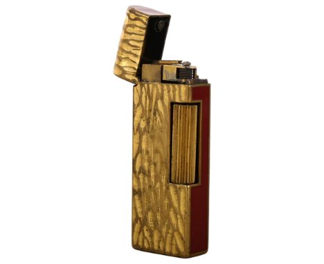 A Vintage Dunhill two-tone lighter with textured body, impressed US.RE 24163 to the underside