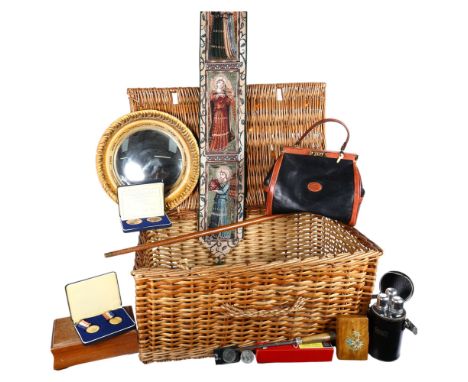 A wicker hamper containing gilt plaster convex mirror, 36cm, a jewel box, medallions, handbag, etc Cane no longer in this lot