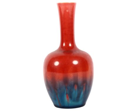 A small Burmantofts red and blue bottle vase, maker's stamp to base, ref. 633, H13.5cm, from the estate of a former Manager a