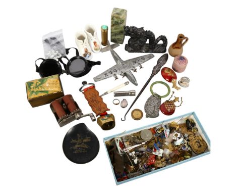 A collection of various items, including a pair of Wellsworth welder goggles, a Dinky Toys ensign glass airliner, scent flask