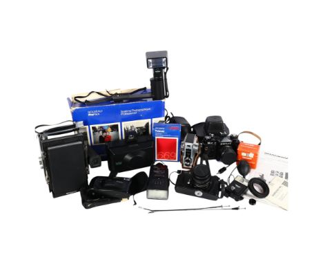 A quantity of Vintage cameras and accessories, including a Cosina CT-1, a Bencini Milano Comet III, a Zenit 12XP, a Polaroid 