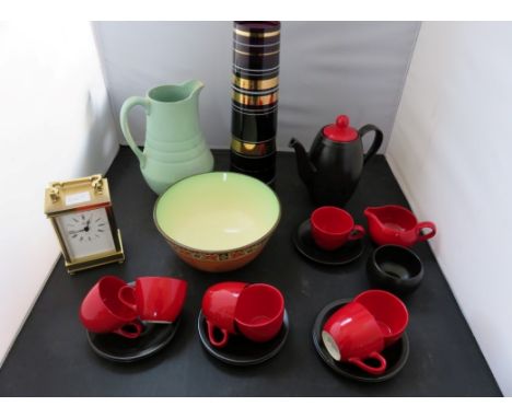 A modern brass cased carriage timepiece; Vogue coffee set; tall amethyst glass vase and small jug and basin  