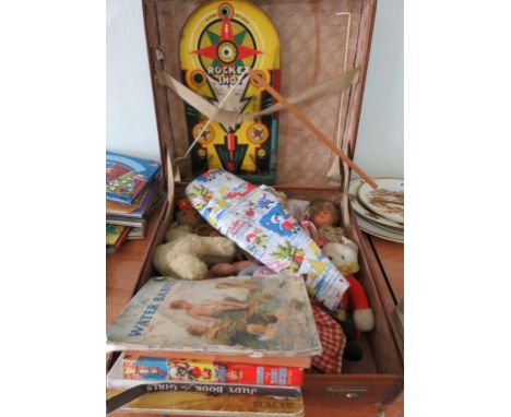 A quantity of dolls, Rocket shot bagatelle board, books and other toys contained in a suitcase