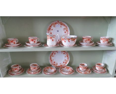 A "Sutherland" tea set with light brown floral and scroll decoration 