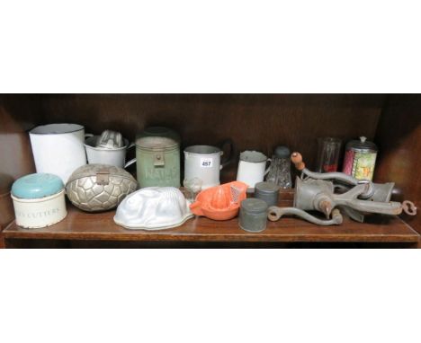 Kitchenalia - an orange Bakelite lemon squeezer;  hare food moulds, Easter egg mould, meat mincers etc 