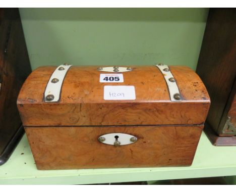 A 19th Century walnut tea caddy with domed top and ivory brass studded banding 