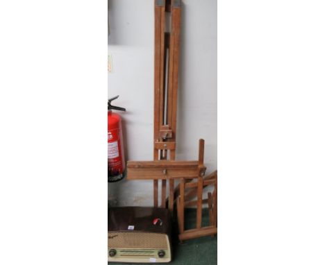 A Ferguson radio in bakelite case and a large artists wood easel 