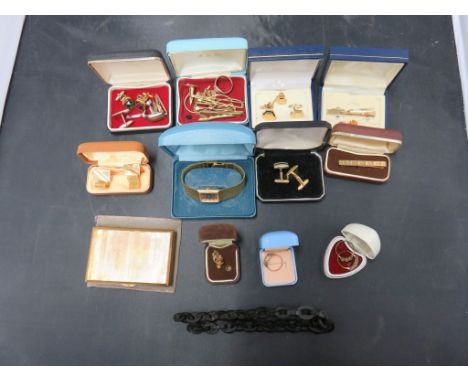 An assortment of costume jewellery including a "ROTARY" wristwatch, scrap 9ct gold ring, 1.9g approx, cufflinks, tie clip, mu