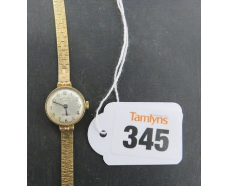 A ladies Rotary wrist watch on 9ct gold link bracelet 