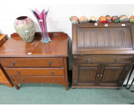 A 20th Century fall front bureau, fitted cupboard doors to base, narrow drawer above, the interior fitted shelf and pigeon ho