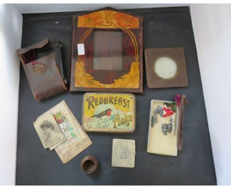 An Art Nouveau style wood photo frame.  Redbreast Flake tobacco tin, cast metal Beatrix Potter figures; postcards, teak from 