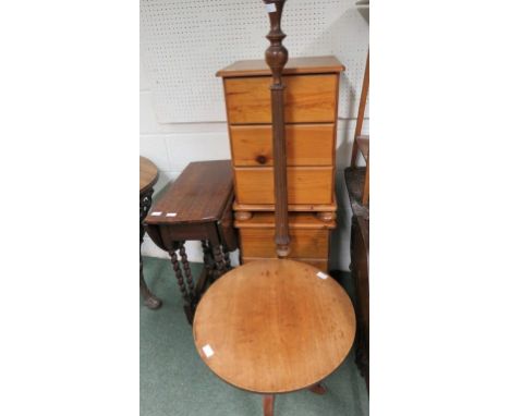 A pair of pine three drawer bedside cabinets, an oak dropleaf table with barley twist legs, a standard lamp and a circular oc