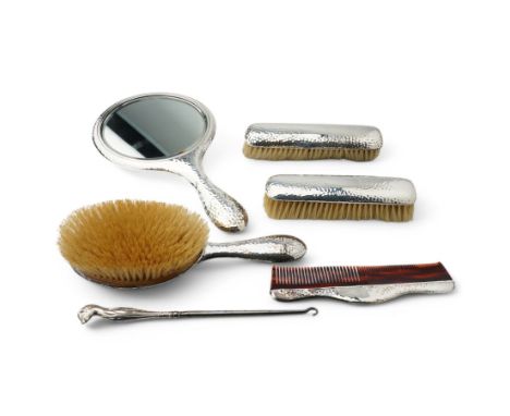 Silver backed five piece planished dressing table set Sheffield 1919/1920 Maker Walker & Hall and an Edwardian button hook w
