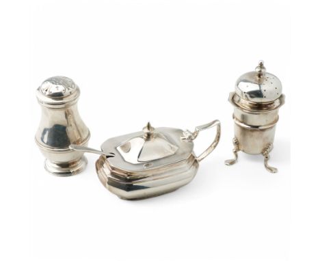 Silver pepperette of baluster form London 1930 retailed by Tessiers Ltd, another on triple supports and a mustard pot with bl