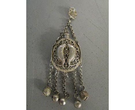 A Chinese white metal bottle decorated with twin fish motifs and pierced work, suspended on a chain and belt hook plaque, fiv