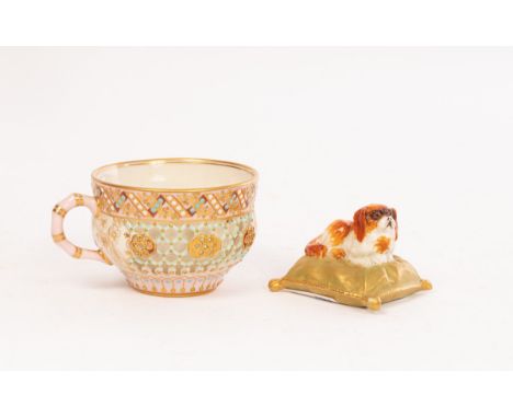 A Royal Worcester reticulated cabinet cup and a miniature Spaniel, the cup by Samuel Ranford (1839-?), pierced in the manner 