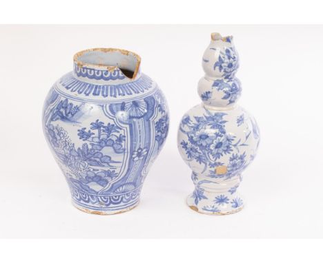 Two Delftware vases, Dutch or possibly English, circa 1670-90, one of multiple gourd shape on a turned foot, painted in blue 
