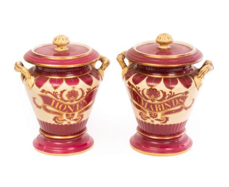 A pair of Samuel Alcock, Staffordshire Chemist's or Pharmacy display jars, circa 1850-60, of Leech Jar shape with covers, dec