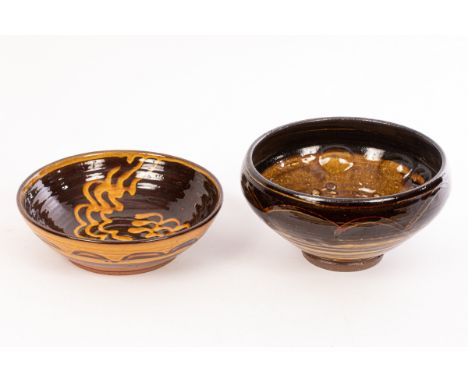 Clive Bowen (born 1943) two slipware bowls, one with rounded sides 25.5cm, a kiln waster given to Henry Sandon by the potter,