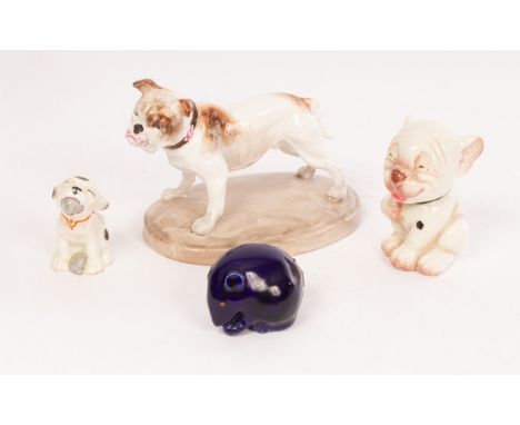 A Royal Worcester model of Bonzo, dated 1930, after the cartoons by George Studdy, 7cm; a Grafton China model of Bonzo, 'The 