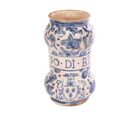 An Italian Maiolica armorial albarello, probably Rome, early 18th Century, of dumbbell shape, painted in blue with the arms o