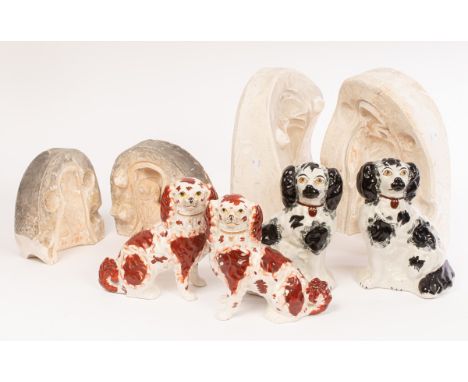 Two good pairs of Staffordshire spaniels, circa 1845-50, one pair with well-defined coats, red markings and separate legs, 17