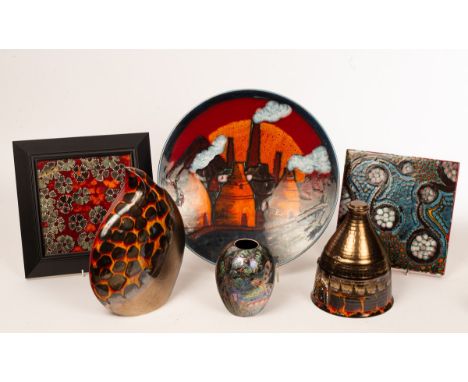 Six pieces of Anita Harris pottery comprising a charger with smoking bottle ovens in Staffordshire, 41cm, numbered 1/10, a te