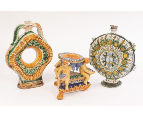 Two Italian Maiolica pilgrim flasks, 17th-18th Century,one painted with the Papal arms of Alexander VII (Pope 1665-1677), the