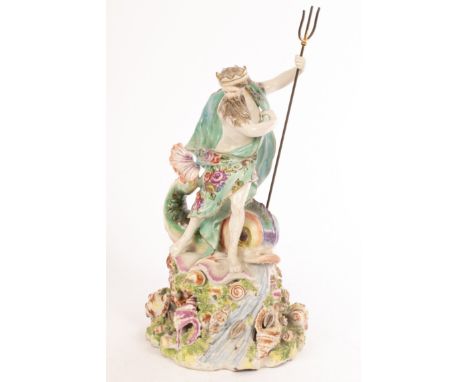 A Derby figure of Neptune standing on a shell, with a dolphin and shells on a rocky base, 27cm high CONDITION REPORT: Base cr