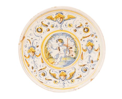 An Italian Maiolica circular tazza, Deruta, mid 17th Century, painted in orange, yellow, manganese and blue with a central pa