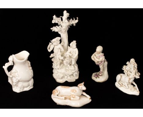 Derby and other porcelain models, comprising an early Derby figure of a boy, circa 1762, painted with 'Cotton Stem' flowers, 