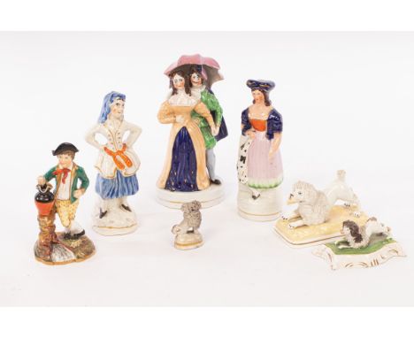 A rare Minton figure and other Staffordshire figures, comprising a Minton figure of a shepherd boy holding a jug, circa 1835,