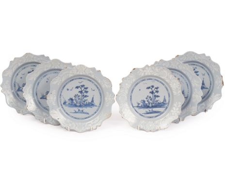 A rare set of six English Delftware plates, Bristol, circa 1755, with shaped lobed rims and 'bianco sopra bianco' borders, th