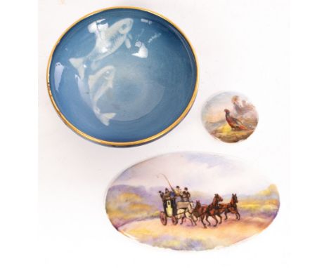 Two Royal Worcester plaques and a pin tray, one with a pheasant by James Stinton, signed, dated 1929, the other oval plaque b