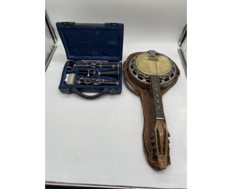 Lot To Include Banjo And Clarinet.