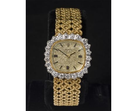 Rolex, manual movement, brilliant cut diamonds on the bezel.  劳力士18k黄金 手动上链, 表壳带钻, 手动机械, 女装