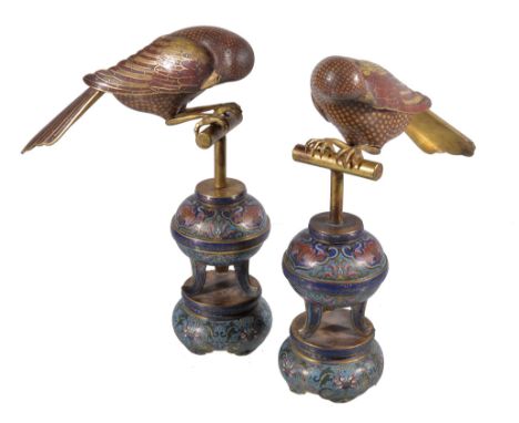  A pair of Chinese cloisonné enamel figures of magpies  , Qing Dynasty, 19th century, shown in mirror image with heads turned