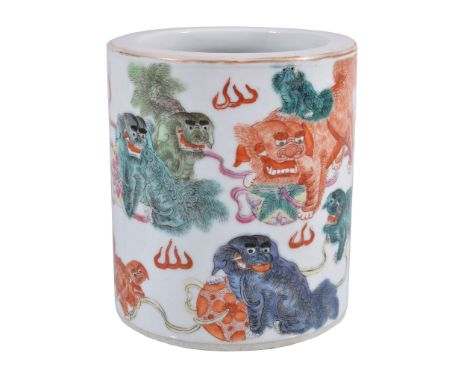  A Chinese  Famille Rose   brush pot,   Qing Dynasty, second half of the 19th century, painted in bright enamels with Buddhis