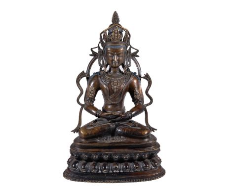  A brass figure of Amitayus  , in Western Tibetan style, seated in  padmasana   on a double lotus throne, his hands joined in