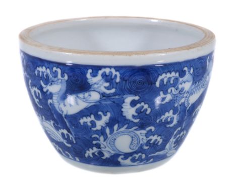  A Chinese blue and white 'scholar's table' small bowl,   late Ming or Kangxi, the exterior painted with mythical sea creatur