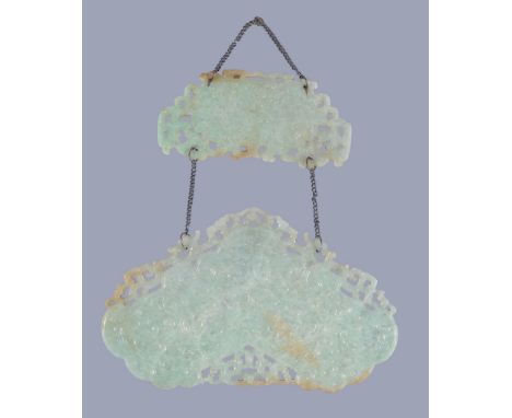  Two Chinese jadeite carved wind chime plaques,   in archaic style, of light green colour with mottled white and russet inclu