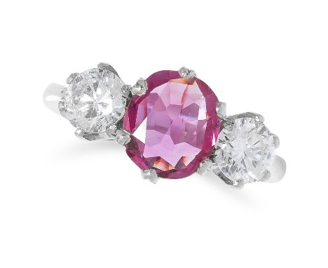 1.37 CARAT THAI NO HEAT RUBY AND DIAMOND THREE STONE RING comprising of an oval cut ruby of 1.37 carats between two round cut