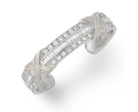 4.35 CARAT DIAMOND CUFF BANGLE set with round and baguette cut diamonds totalling approximately 4.35 carats, 6cm inner diamet