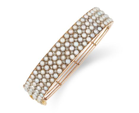 ANTIQUE PEARL AND DIAMOND BANGLE set with seed pearls and rose cut diamonds, 6cm inner diameter, 24.8g.